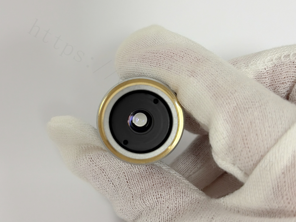 Mounting screw side of Nikon BE2 Plan 100X microscope objective