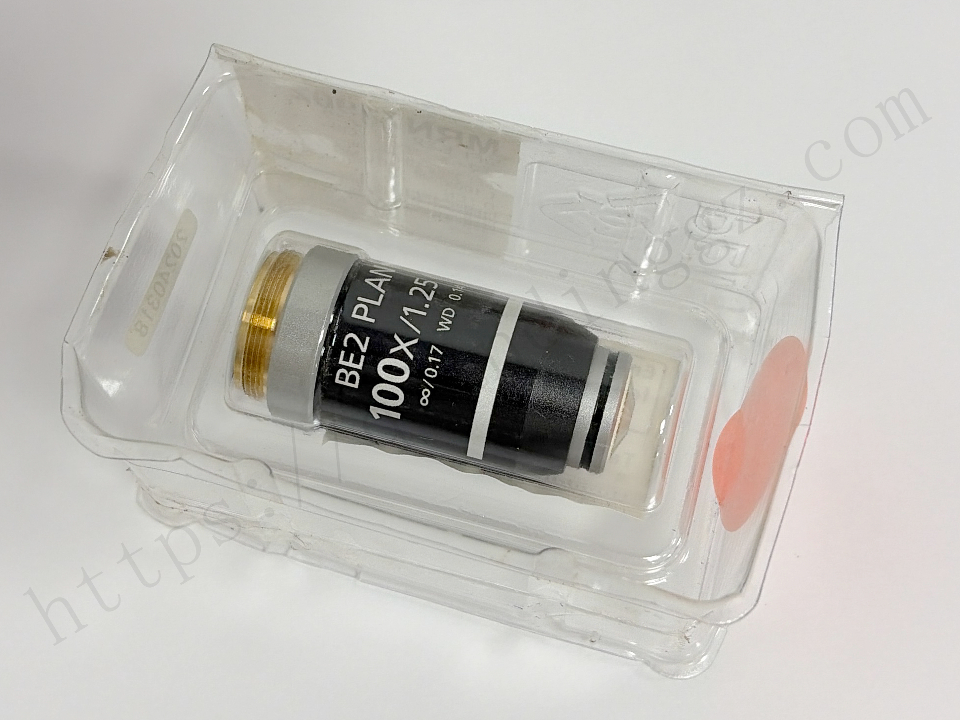 Nikon BE2 Plan 100X/1.25 Oil Objective Lens in protective packaging