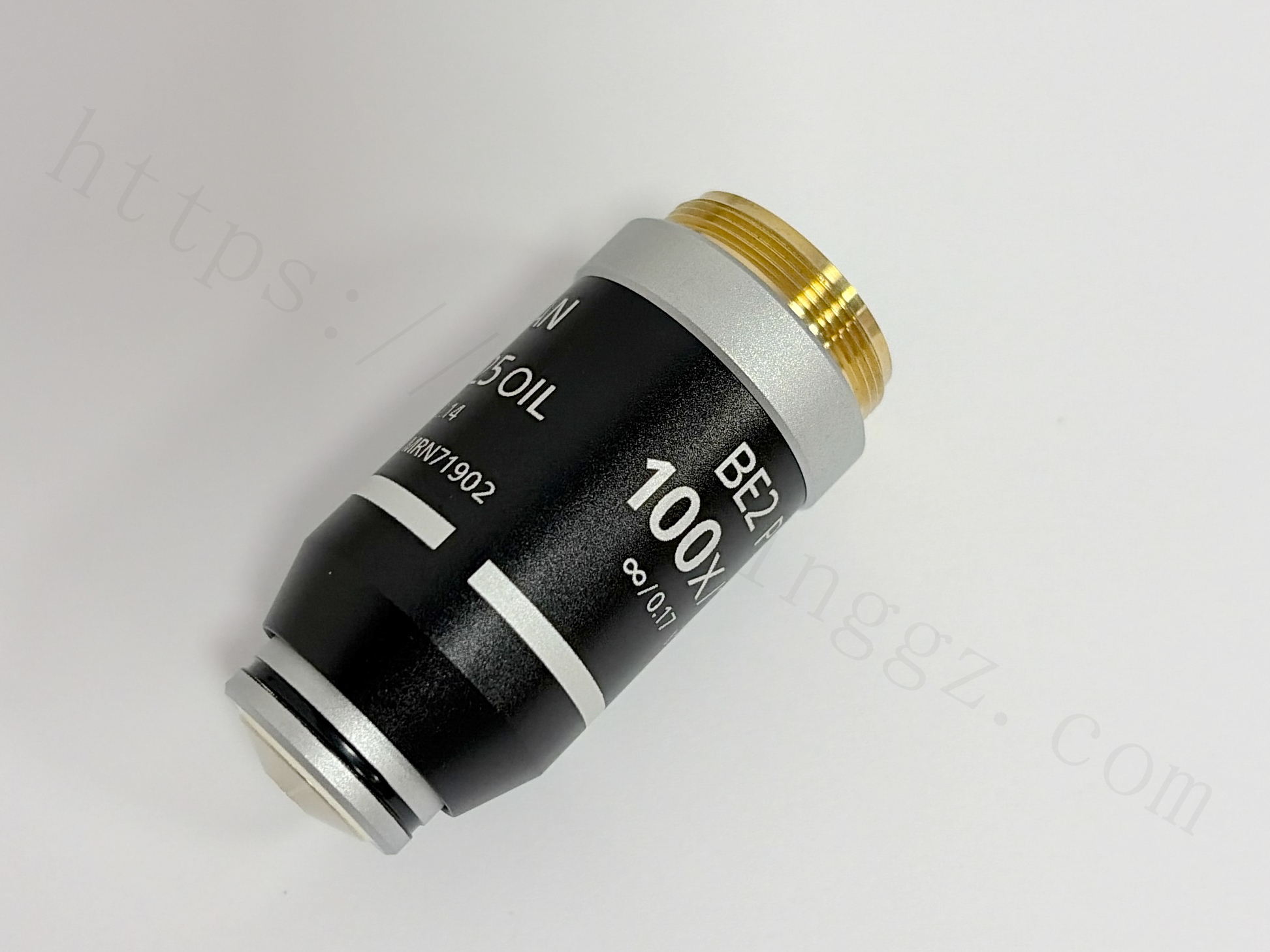 Close-up of optical specifications on Nikon BE2 Plan 100X objective