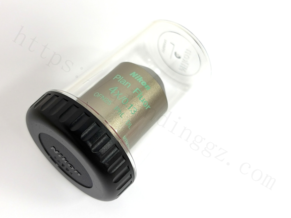 Nikon 4x Phase Contrast objective lens with original black cap and plastic case