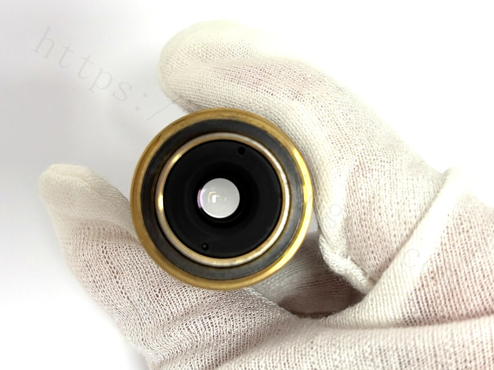 Nikon Plan 50x objective, top view showing screw thread and inner glass