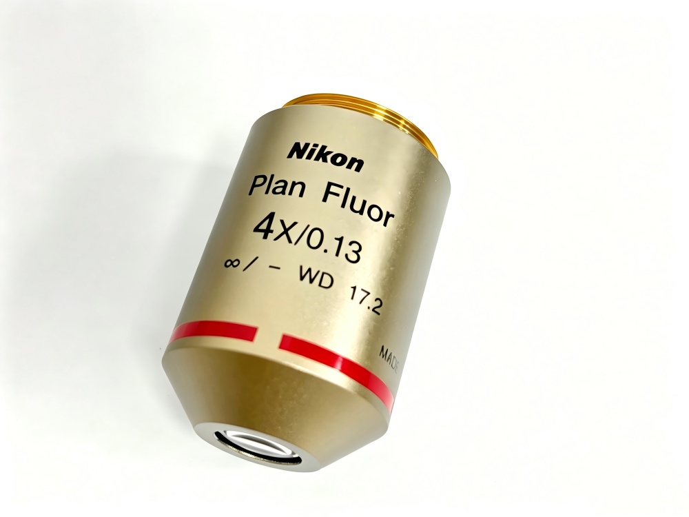Nikon Plan Fluor 4x 0.13 microscope objective lens, front profile view