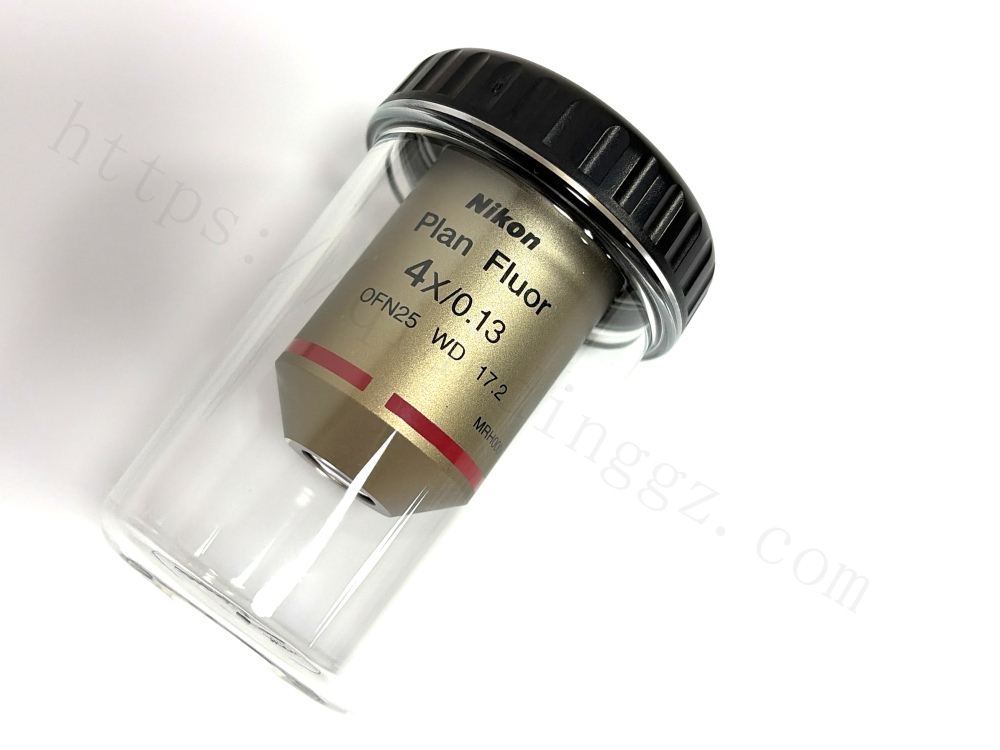 Nikon Plan Fluor 4x objective inside its clear protective plastic storage vial