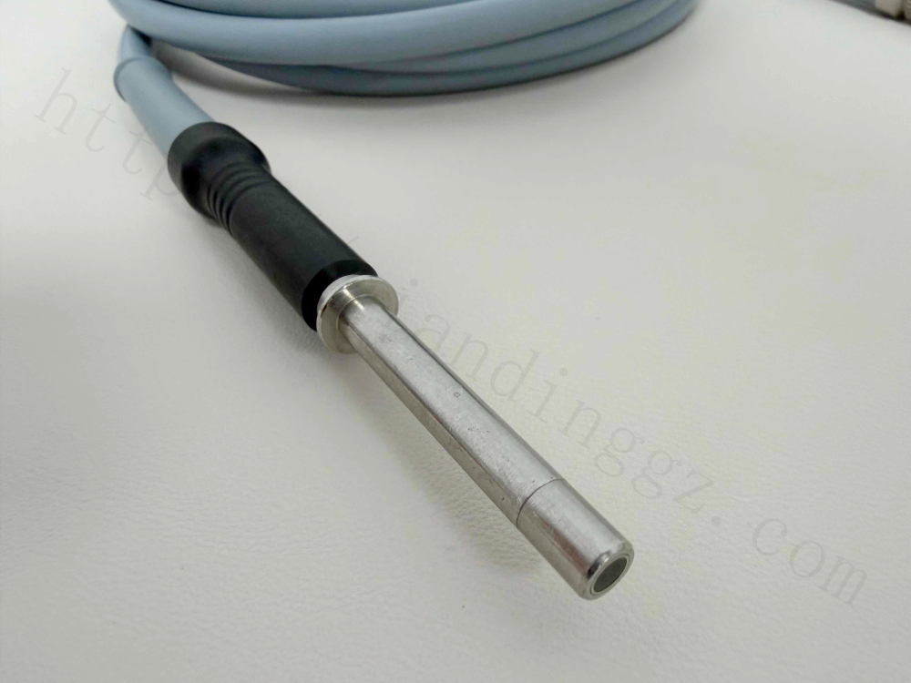 Alt: Metal instrument connector tip of Karl Storz 495 NCS endoscopy cable