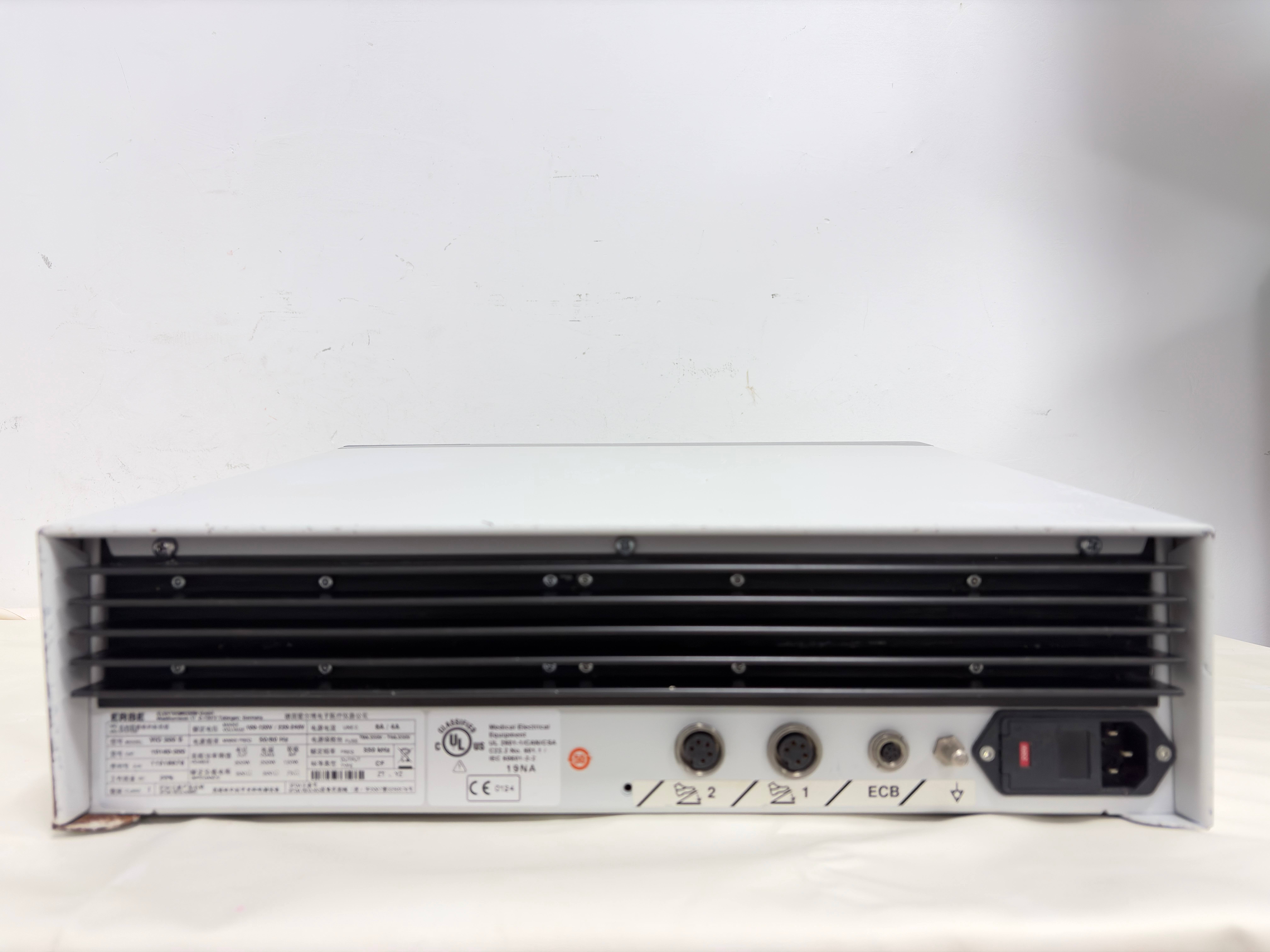 ERBE VIO 300 S electrosurgical unit rear panel, showing cooling fins, power socket, and foot switch ports.