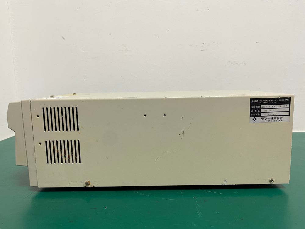 Left side profile view of used Tosoh DP-8020 high pressure liquid chromatography pump