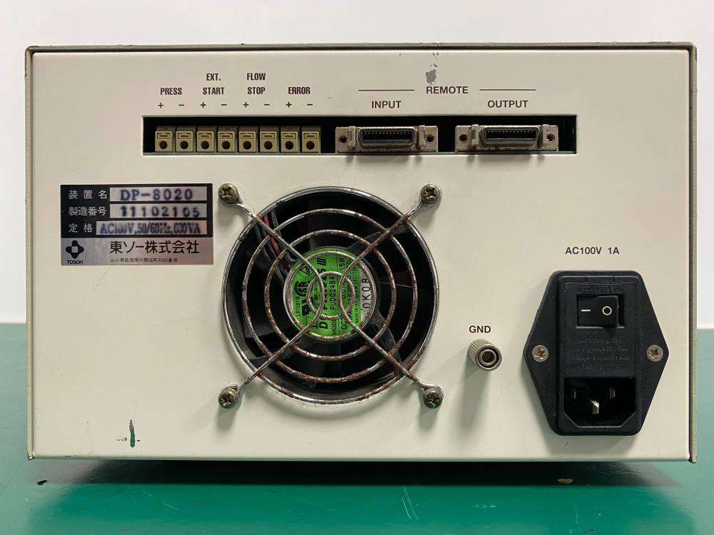 Back panel of used Tosoh DP-8020 HPLC pump showing serial number 11102105 and AC100V power specs
