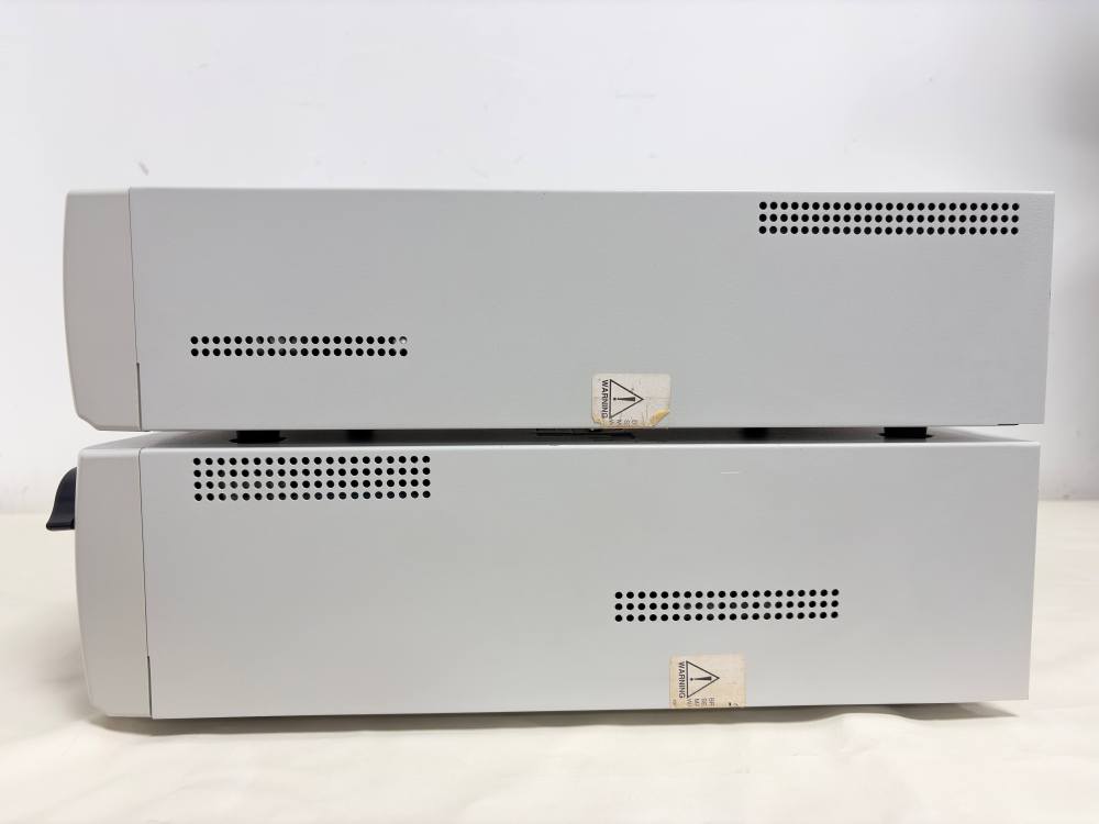 Side profile of used Stryker 1288 HD and L9000 medical equipment showing ventilation