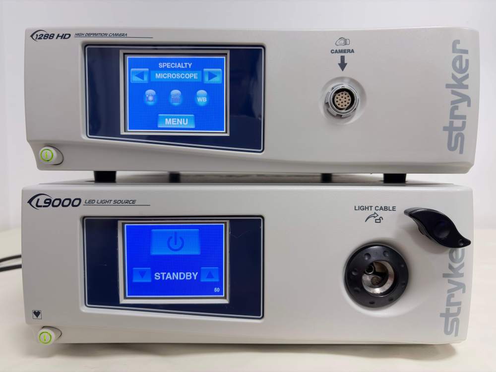 Used Stryker 1288 HD Camera Control Unit and L9000 LED Light Source powered on front view