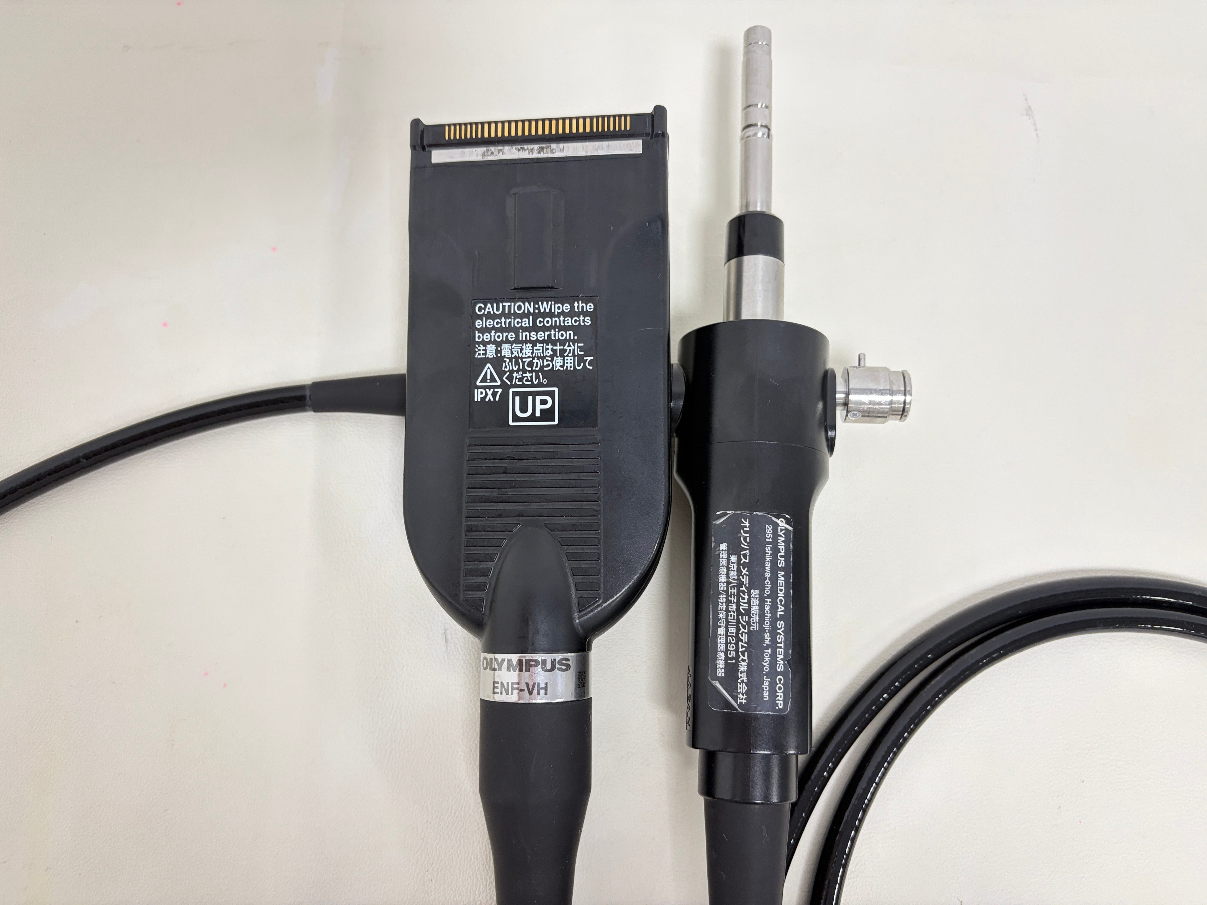 Close-up of Olympus ENF-VH connector, IPX7 waterproof mark, medical videoscope