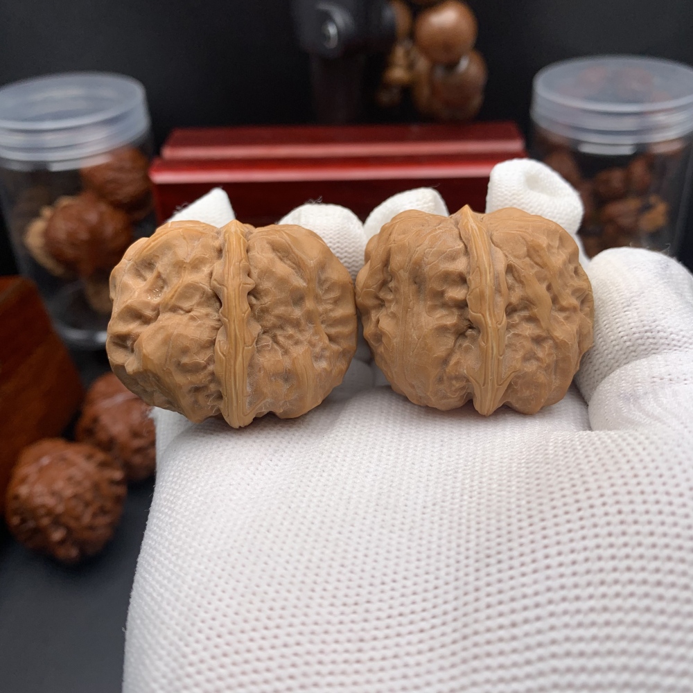 HEADLINE: CUSTOM ENGRAVED WENWAN WALNUTS | PERSONALIZE YOUR PAIR Sub-headline: Your Story, Your Symbol, Carved in Stone. 100% Customizable Vector Engraving for Every Occasion.