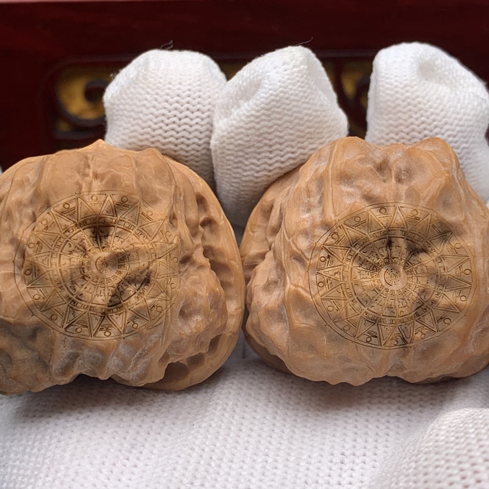HEADLINE: CUSTOM ENGRAVED WENWAN WALNUTS | PERSONALIZE YOUR PAIR Sub-headline: Your Story, Your Symbol, Carved in Stone. 100% Customizable Vector Engraving for Every Occasion.