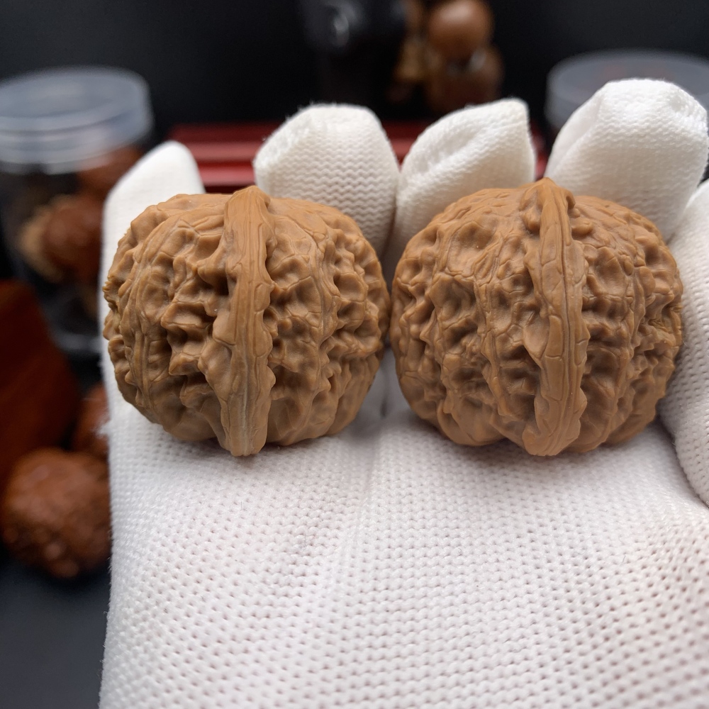 HEADLINE: CUSTOM ENGRAVED WENWAN WALNUTS | PERSONALIZE YOUR PAIR Sub-headline: Your Story, Your Symbol, Carved in Stone. 100% Customizable Vector Engraving for Every Occasion.