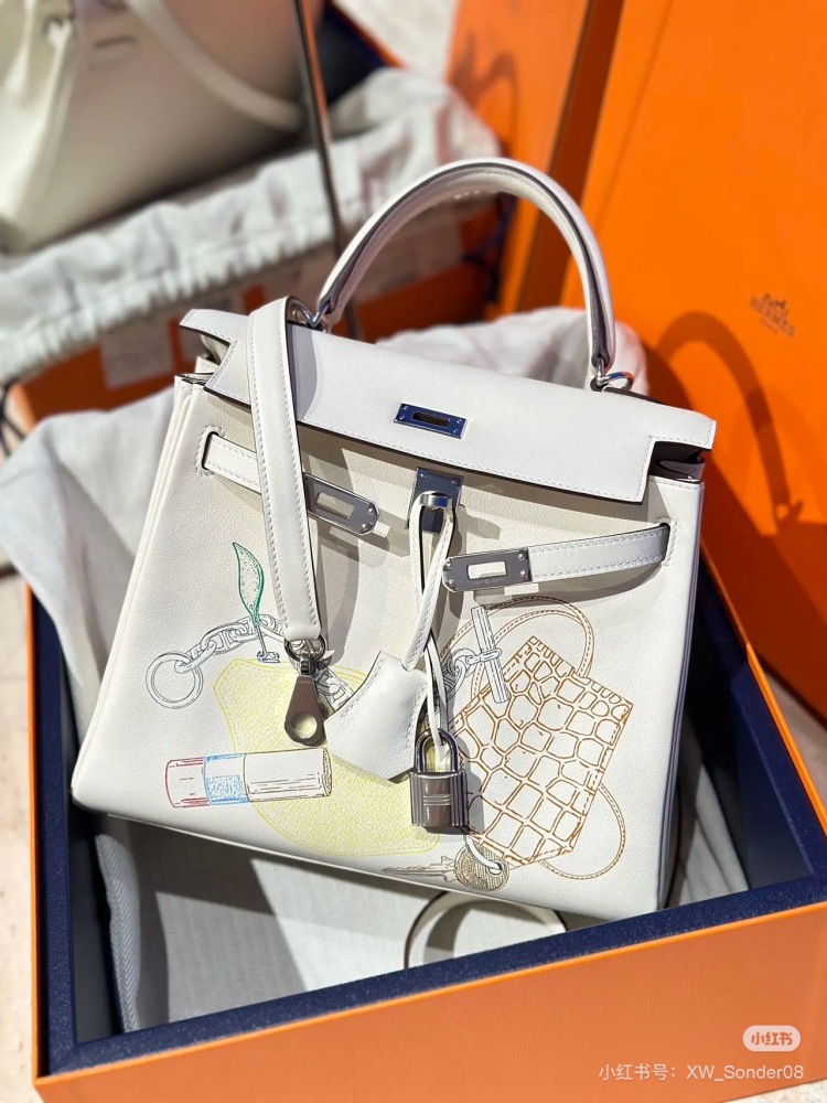 Limited edition painted bag
Hermes Kelly 25 in and out limited edition painted cream silver buckle swift leather