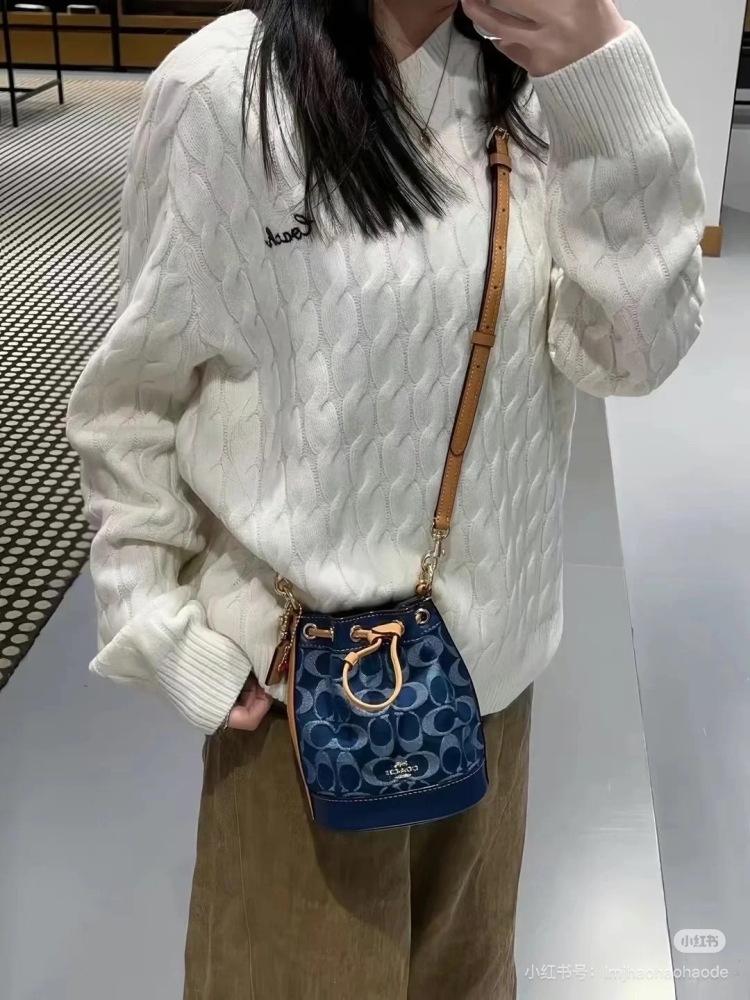 Coach denim small water bucket