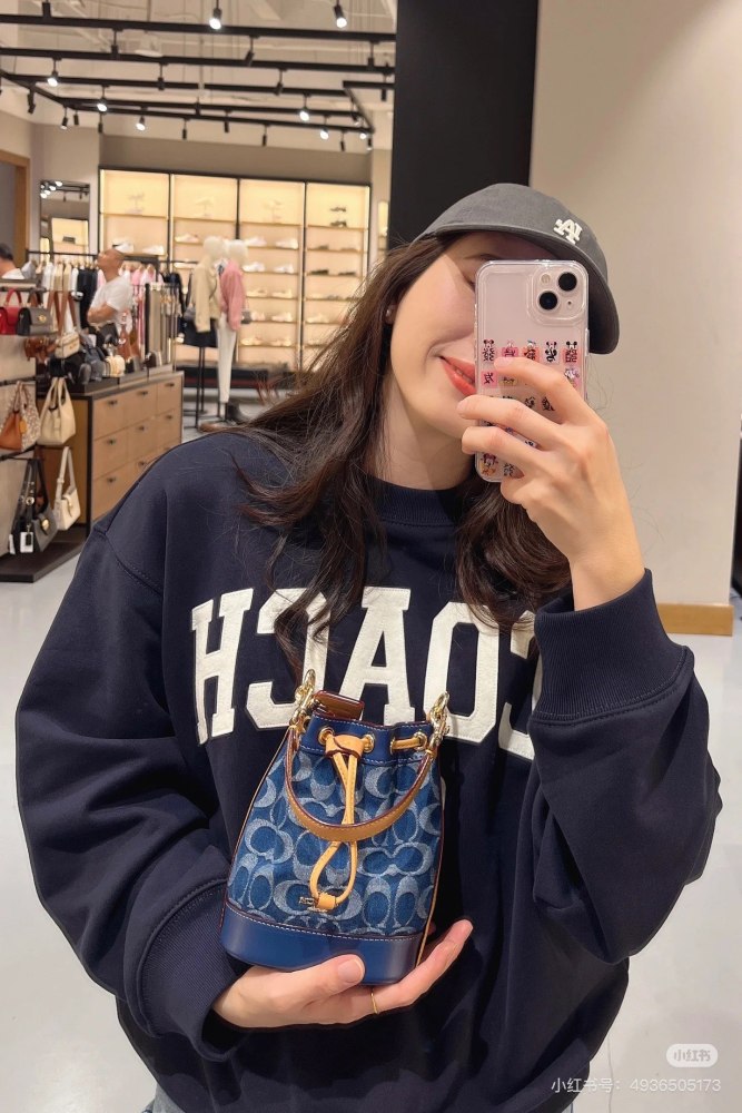 Coach denim small water bucket