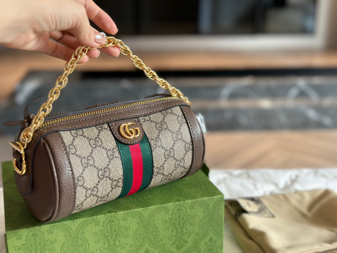 Gucci Rose Gold Logo-Accented Bag 581