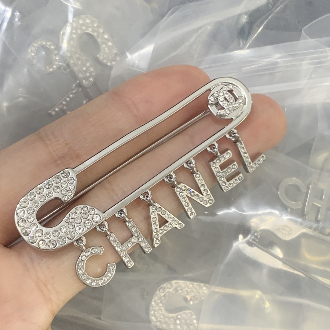 Chanel Silver Logo-Accented Brooch 1137