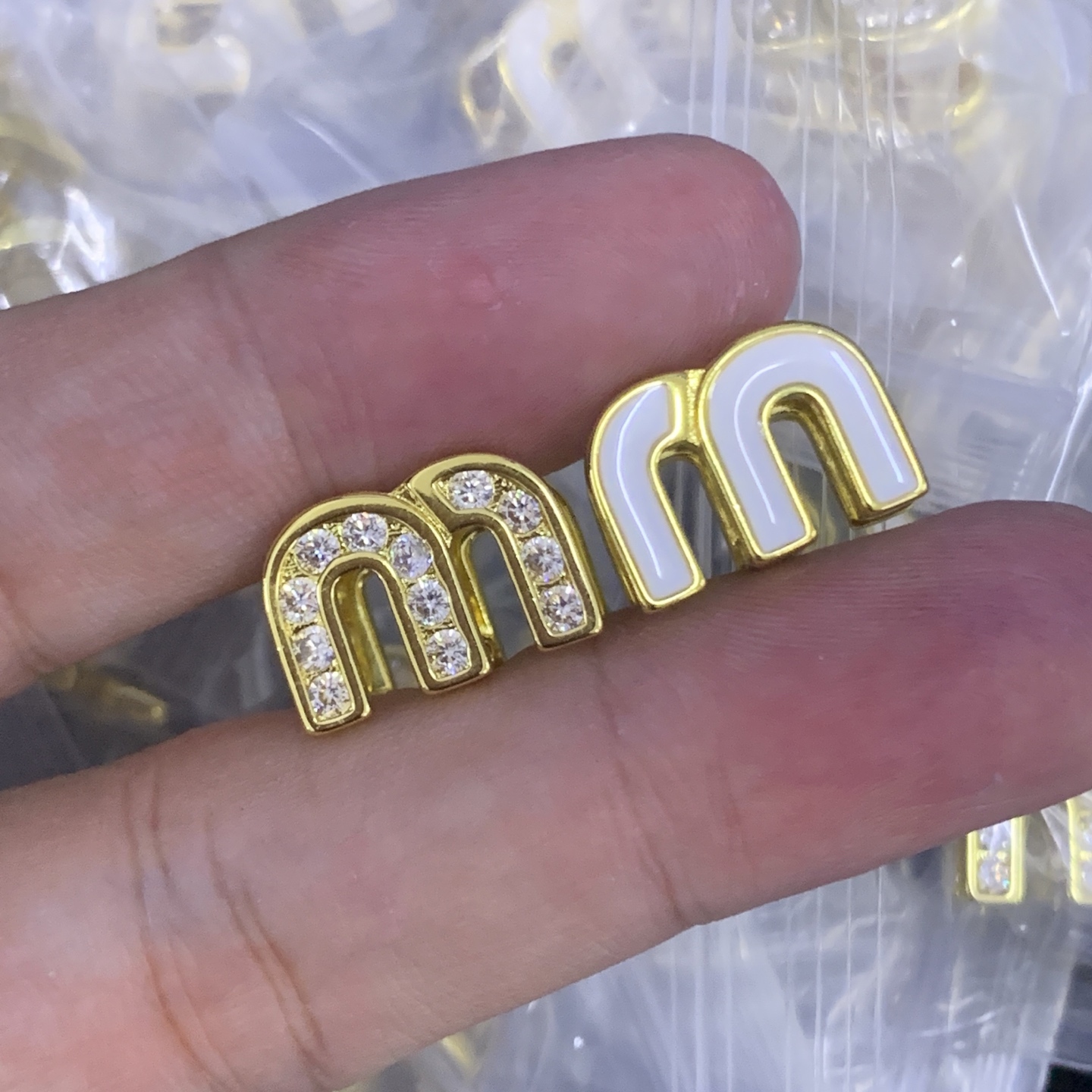 Miu Miu Gold Logo-Accented Earrings 019