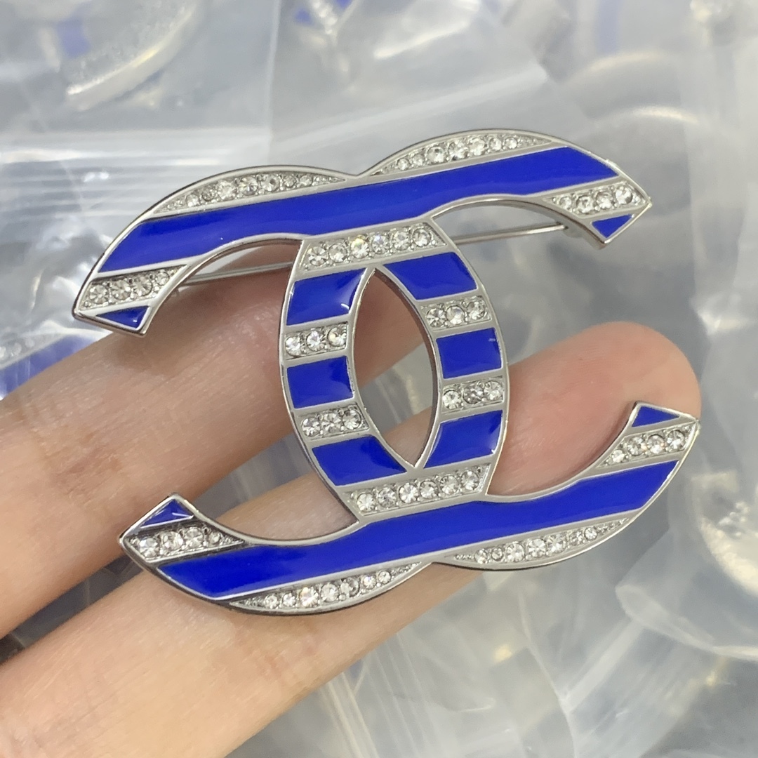 Chanel Silver Logo-Accented Brooch 1105
