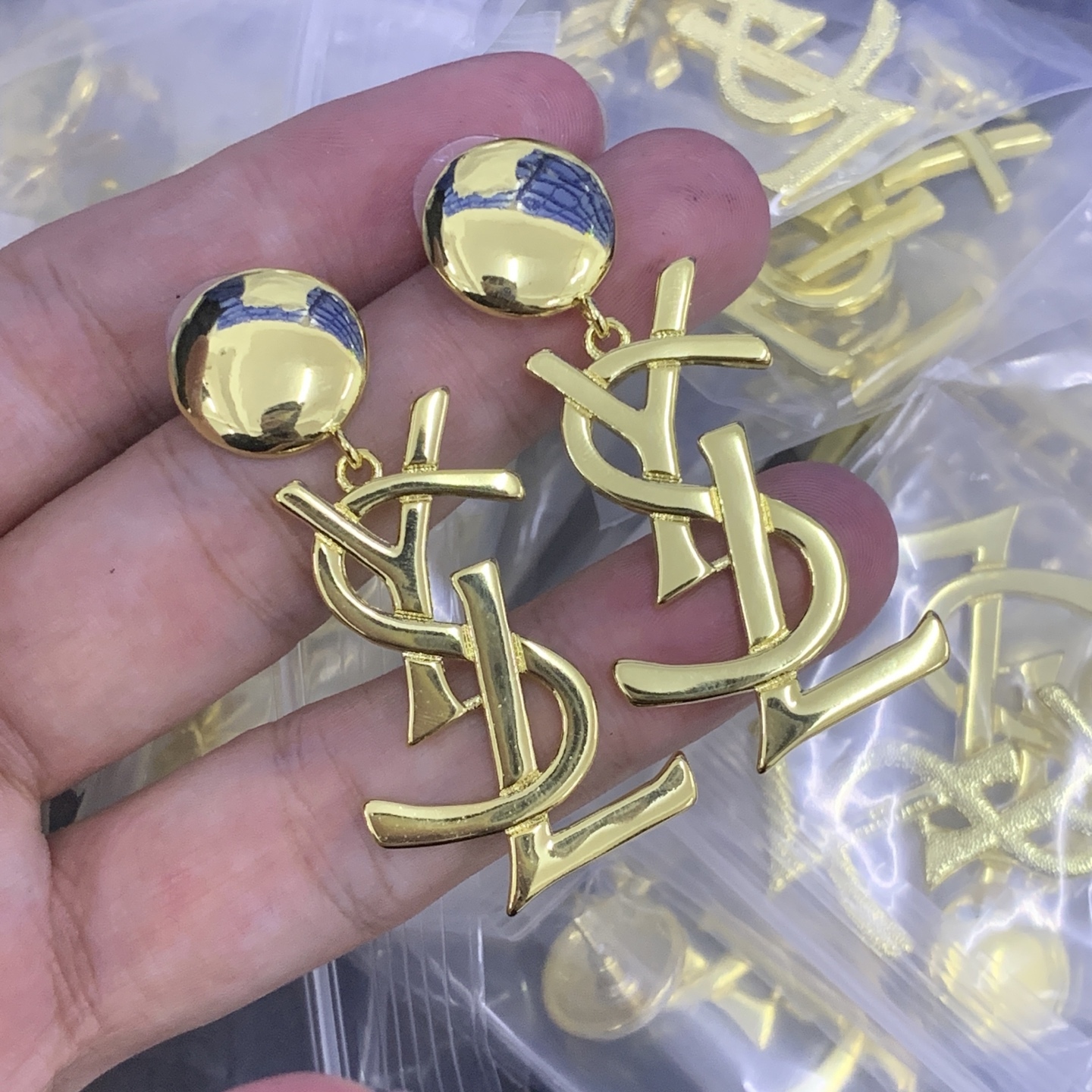 YSL Gold Logo-Accented Earrings 057