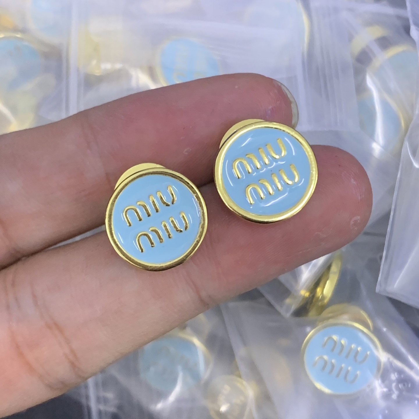 Miu Miu Gold Logo-Accented Earrings 005