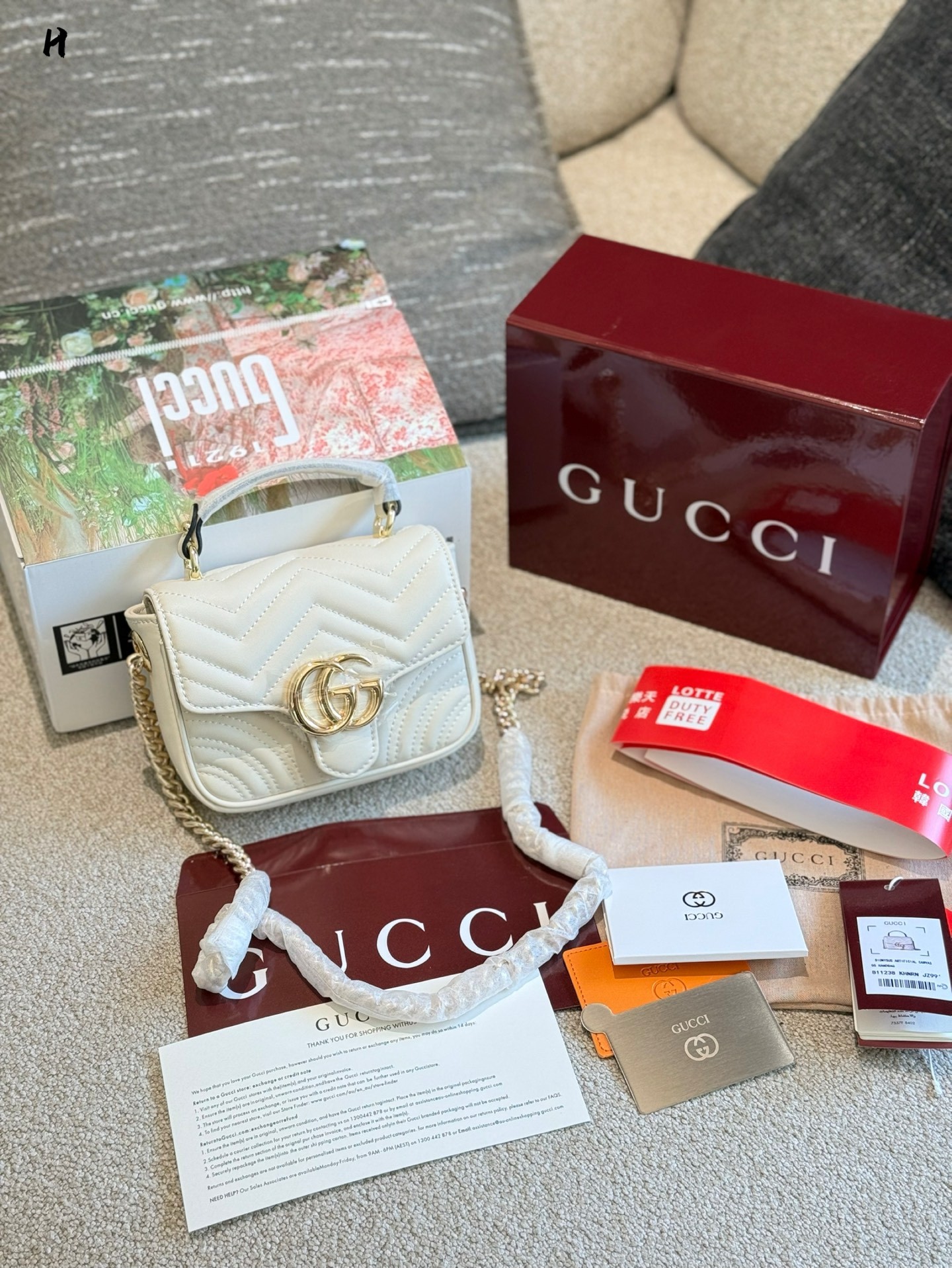Gucci Rose Gold Logo-Accented Bag 551