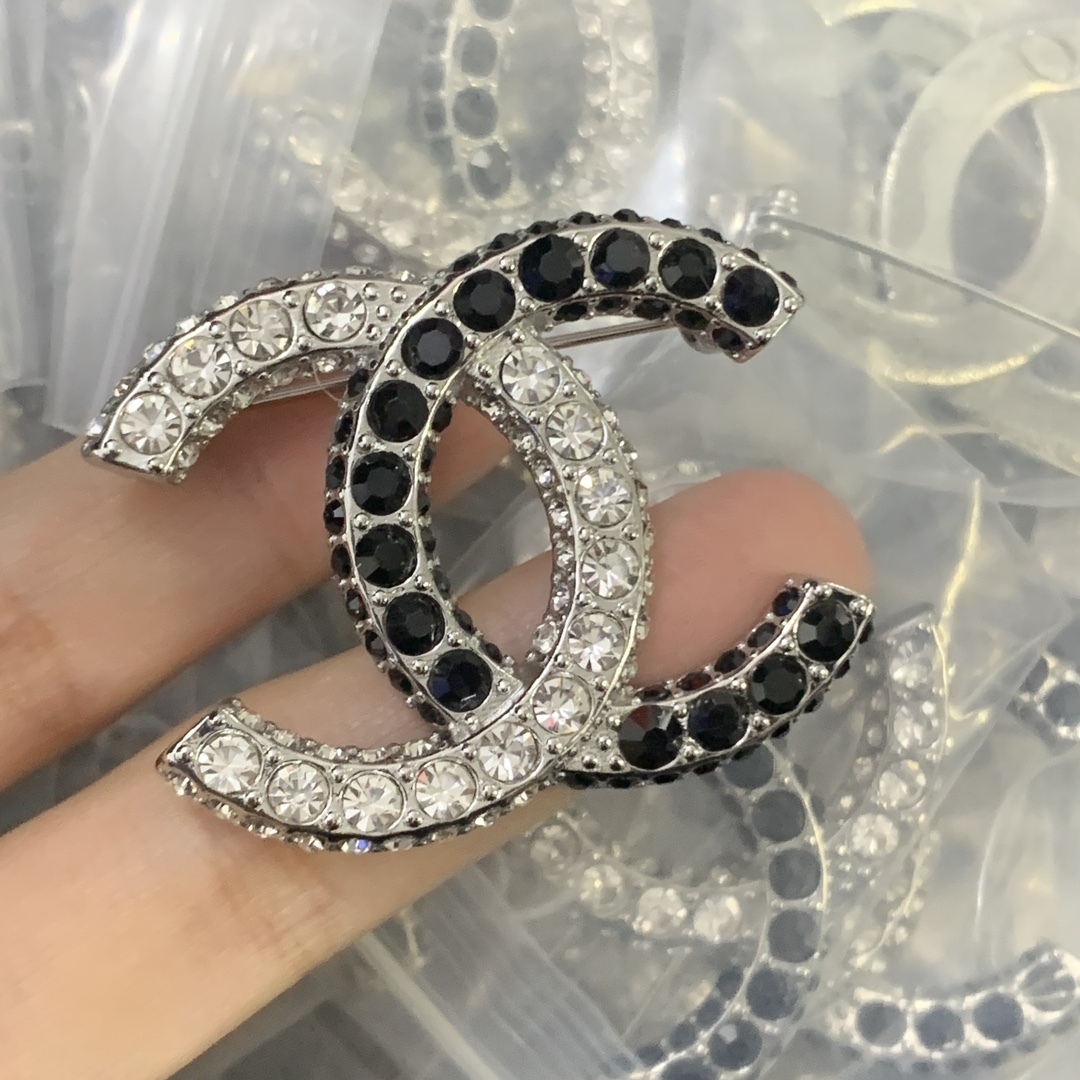 Chanel Silver Logo-Accented Brooch 1149