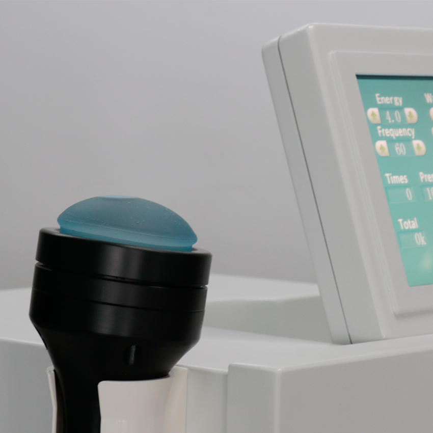 Apparecchio portatile per terapia ad onde d'urto focalizzate per la gestione del dolore e il trattamento della disfunzione erettile