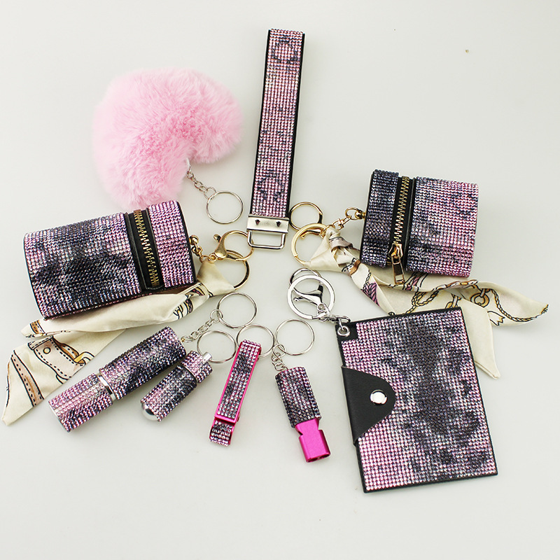 Amazon cross-border diamond snake pattern oval lipstick earphone storage bag ID bag whistle bottle opener hair ball 10 pieces