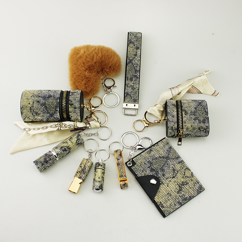 Amazon cross-border diamond snake pattern oval lipstick earphone storage bag ID bag whistle bottle opener hair ball 10 pieces