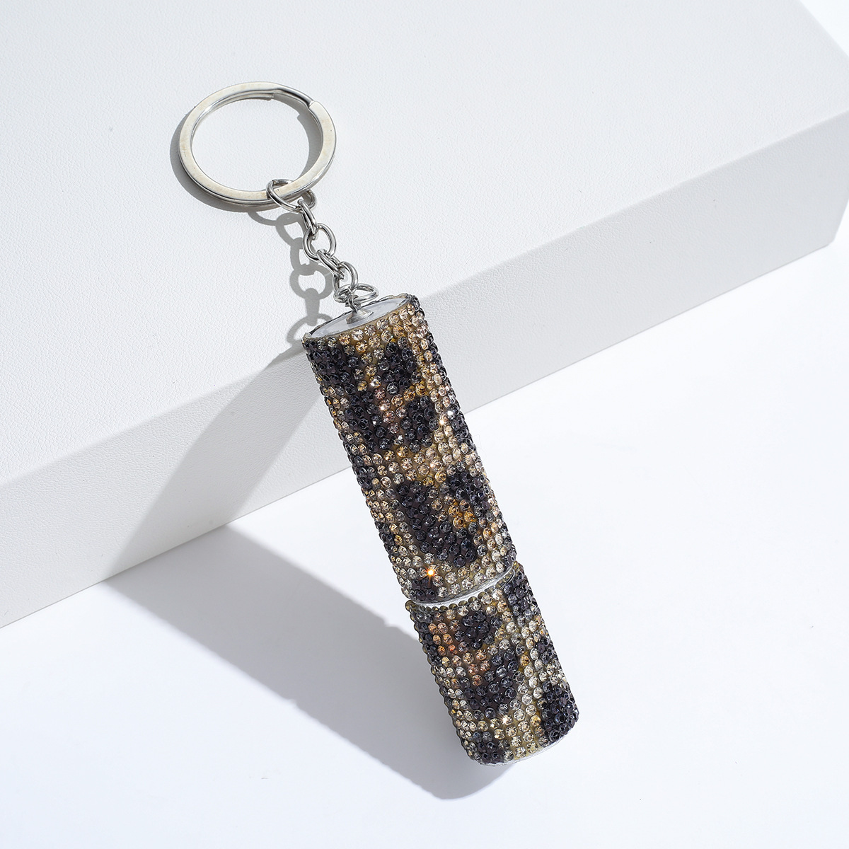 Wholesale bling perfume bottle keychain.