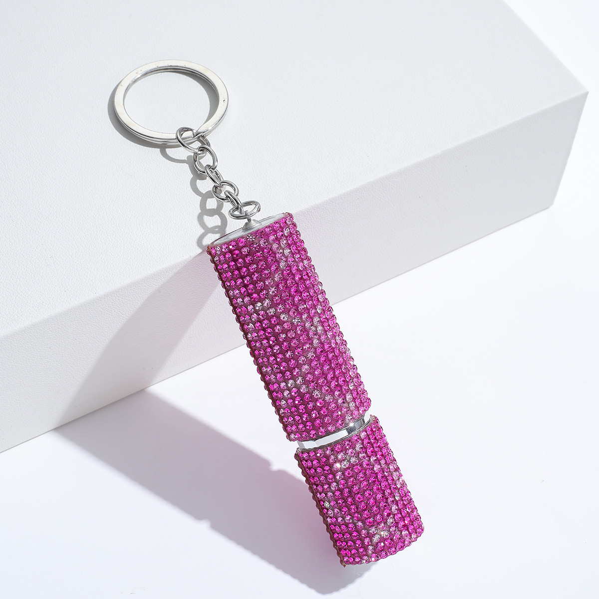 Wholesale bling perfume bottle keychain.