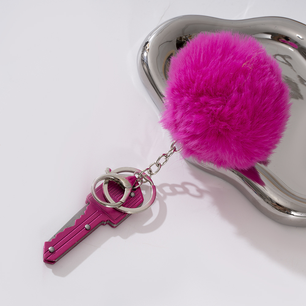 Wholesale key knife + fur ball key chain.