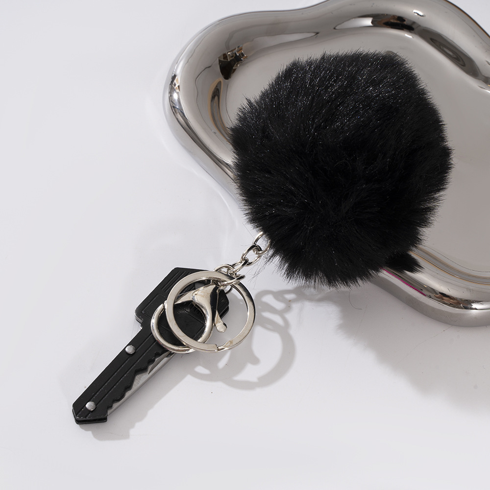 Wholesale key knife + fur ball key chain.