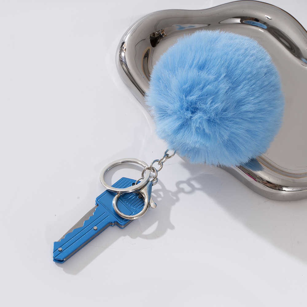 Wholesale key knife + fur ball key chain.