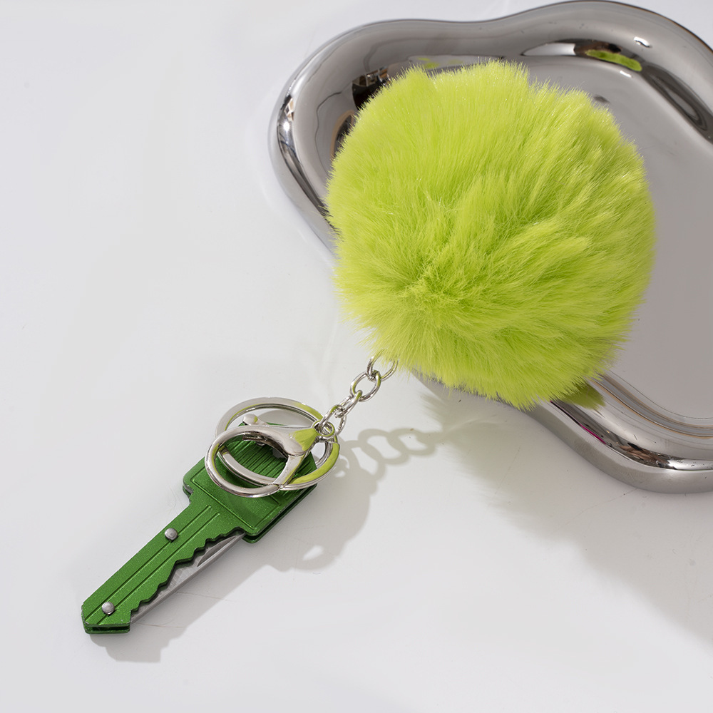 Wholesale key knife + fur ball key chain.