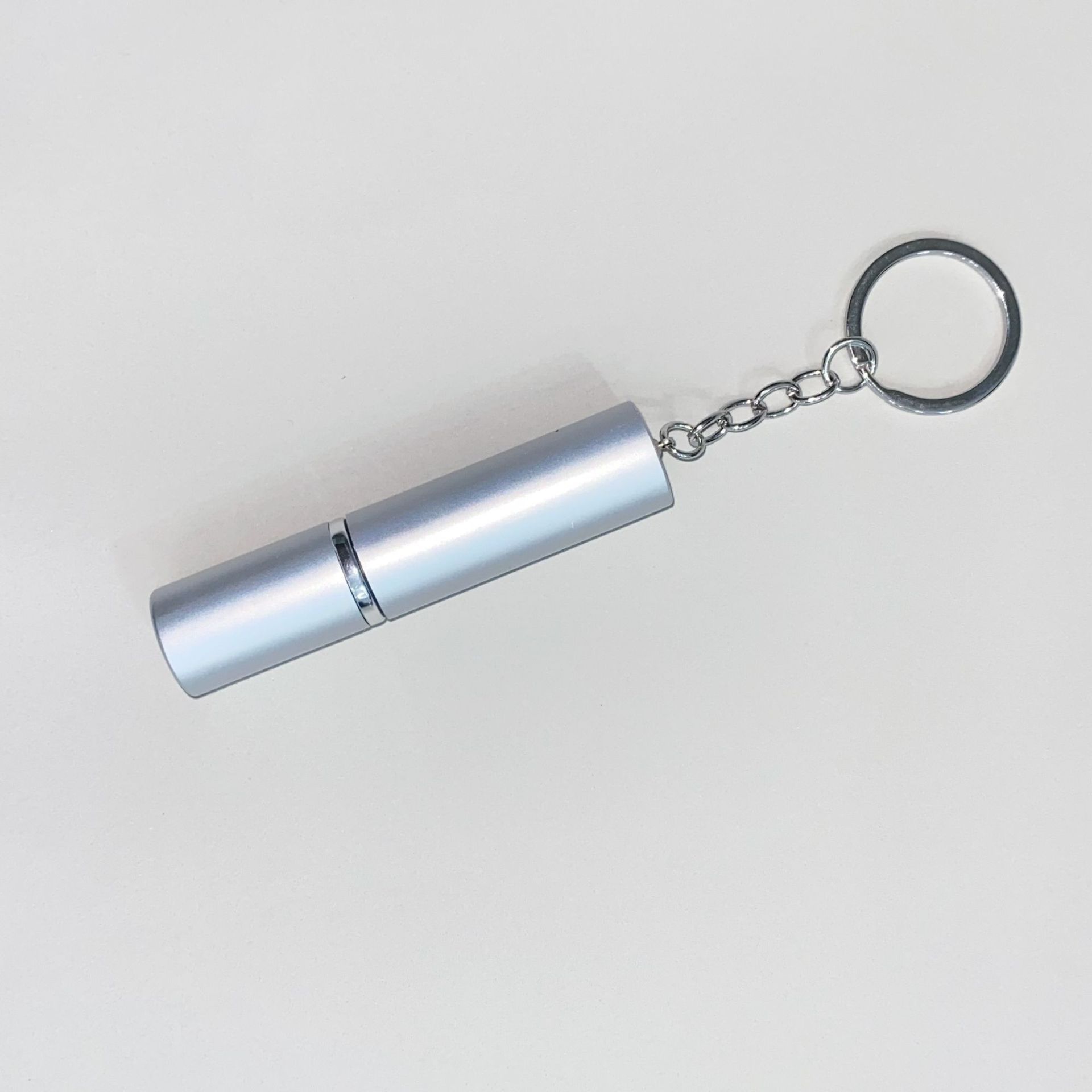 Wholesale 5ml perfume bottle keychain.