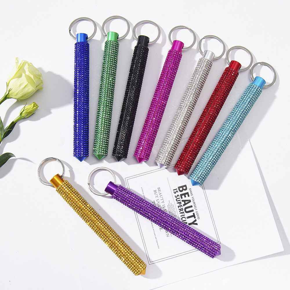 Wholesale round head bling self-defense stick/window breaker keychain.