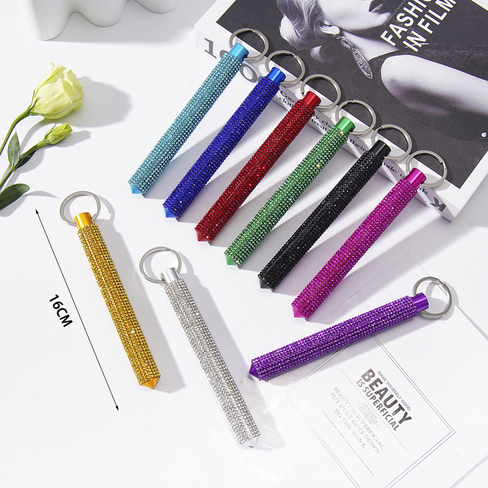 Wholesale round head bling self-defense stick/window breaker keychain.
