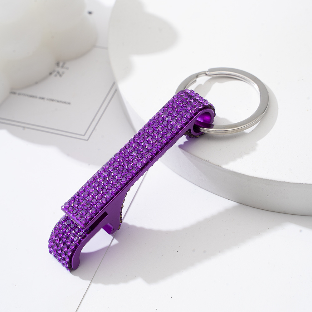 Wholesale bling bottle opener keychain.