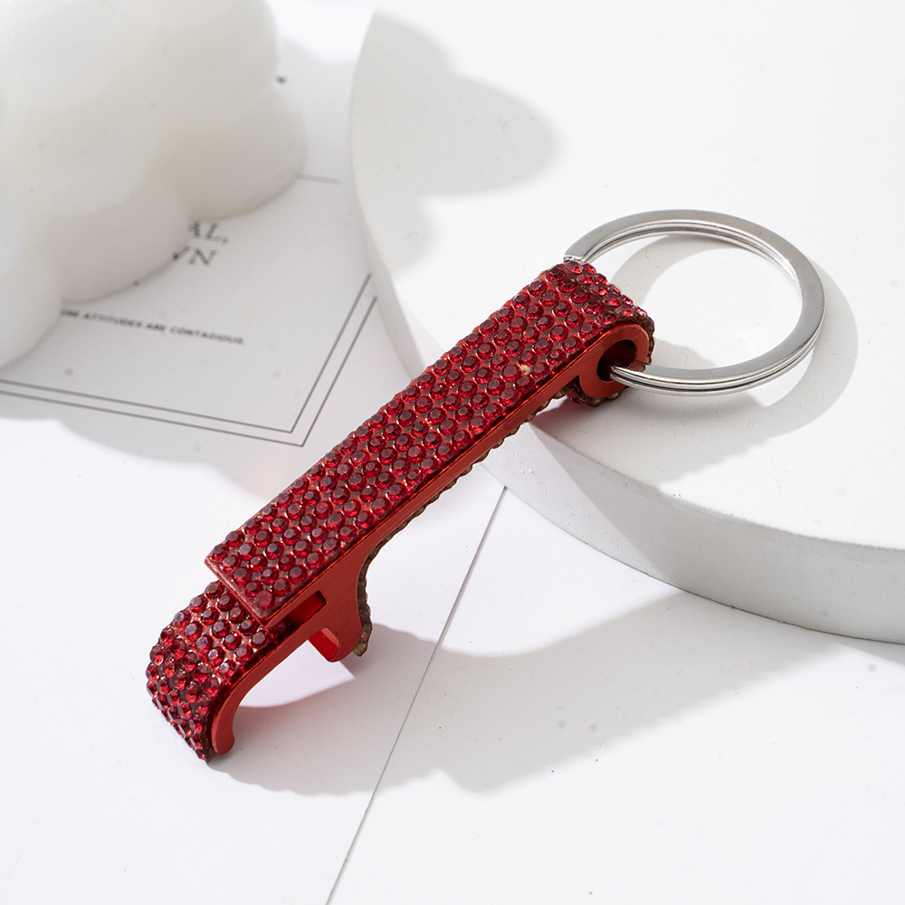 Wholesale bling bottle opener keychain.