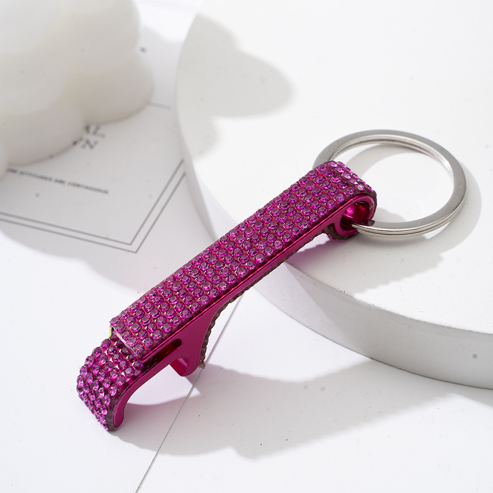 Wholesale bling bottle opener keychain.