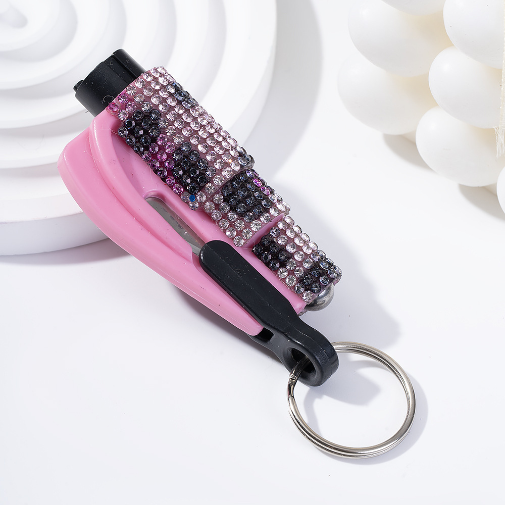Wholesale bling seat belt cutter / window breaker keychain.
