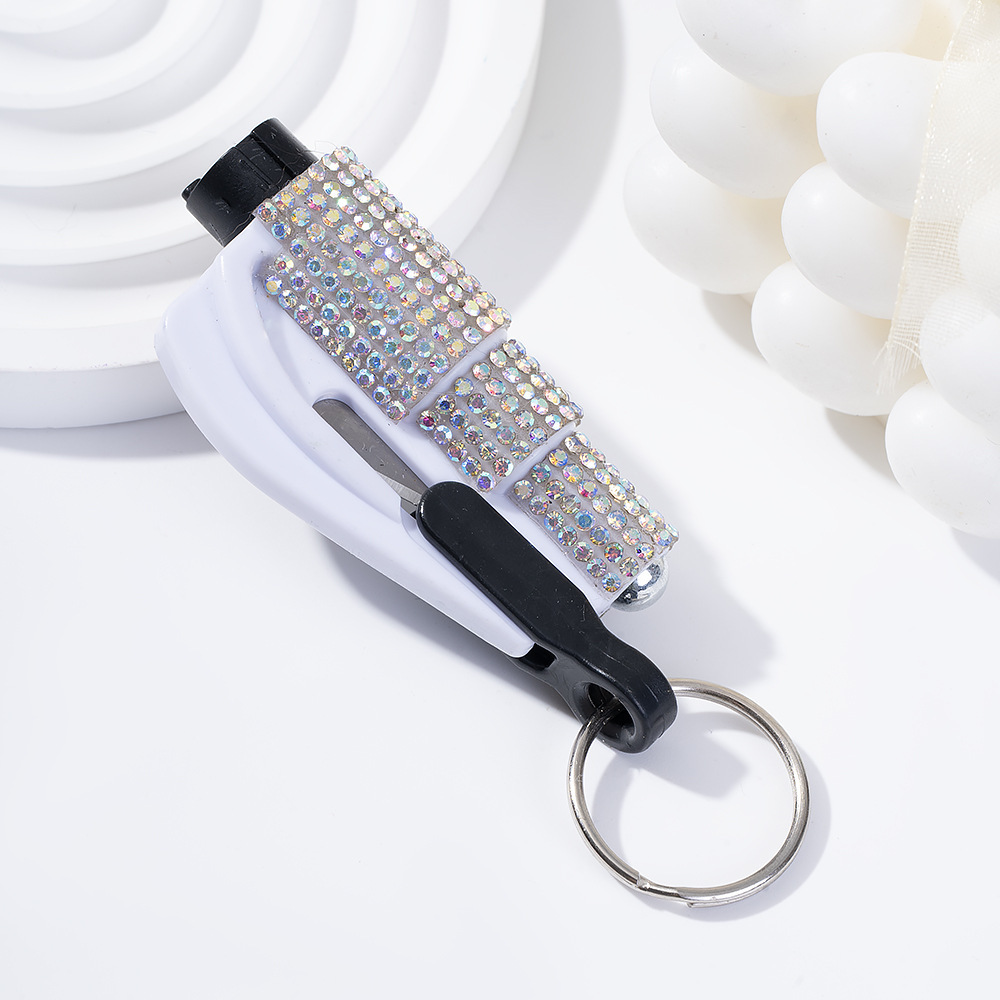 Wholesale bling seat belt cutter / window breaker keychain.