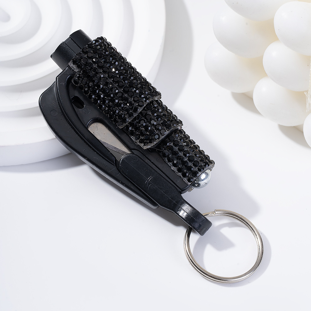 Wholesale bling seat belt cutter / window breaker keychain.