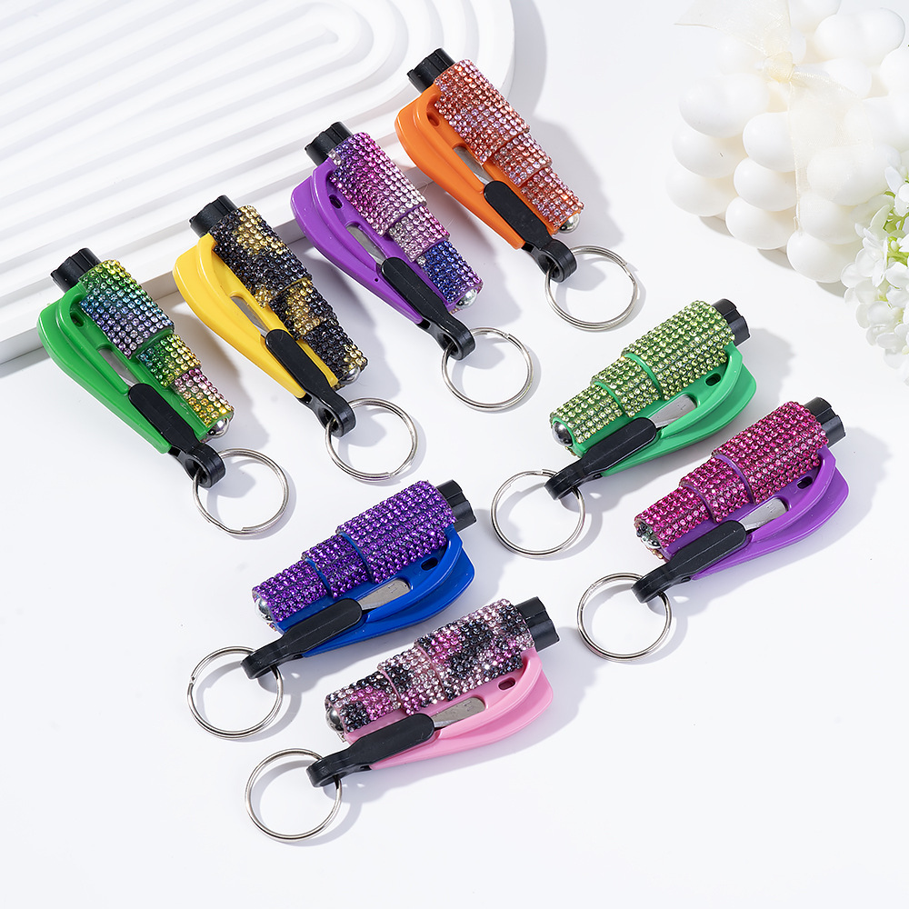 Wholesale bling seat belt cutter / window breaker keychain.