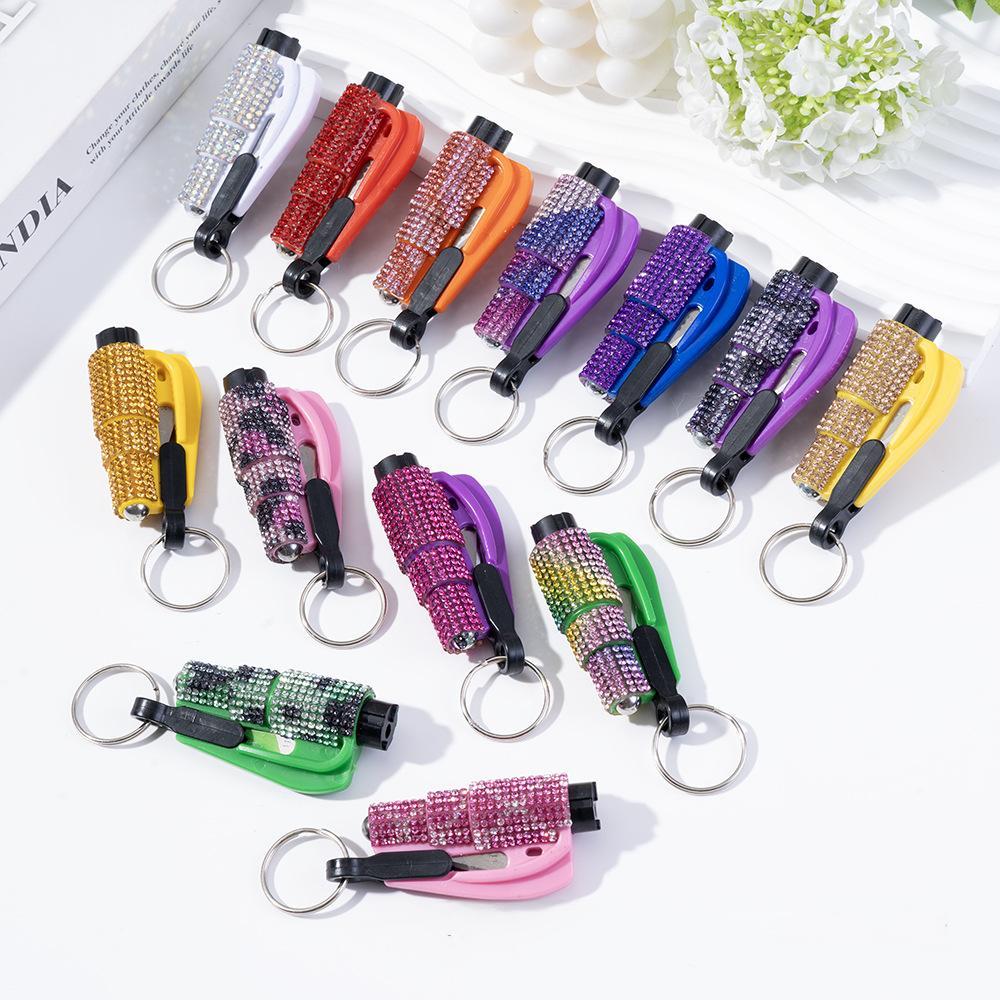 Wholesale bling seat belt cutter / window breaker keychain.