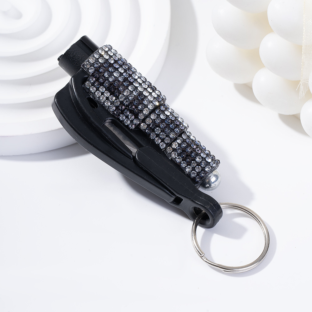 Wholesale bling seat belt cutter / window breaker keychain.