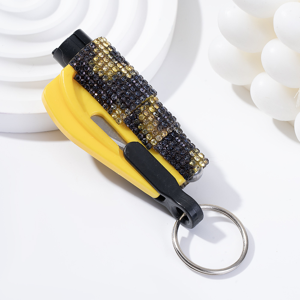 Wholesale bling seat belt cutter / window breaker keychain.